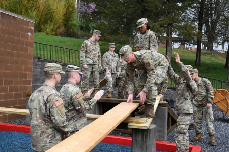 Air Force ROTC cadets work together on ֻ̳leadership reaction course.