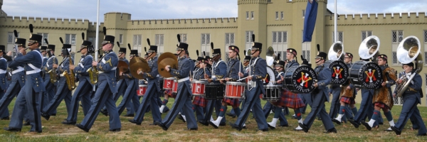Members of the Corps of Cadets march in a Founders Day parade at ֻ̳.
