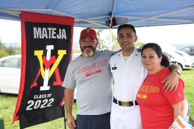 Members of the Mateja family pose at their tailgating tent during the 2021 Family Weekend on post. —ֻ̳Photo by H. Lockwood McLaughlin